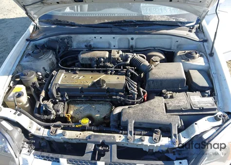 2005 Hyundai Accent Gls z USA, uszkodzony, nr VIN KMHCG45C15U612612